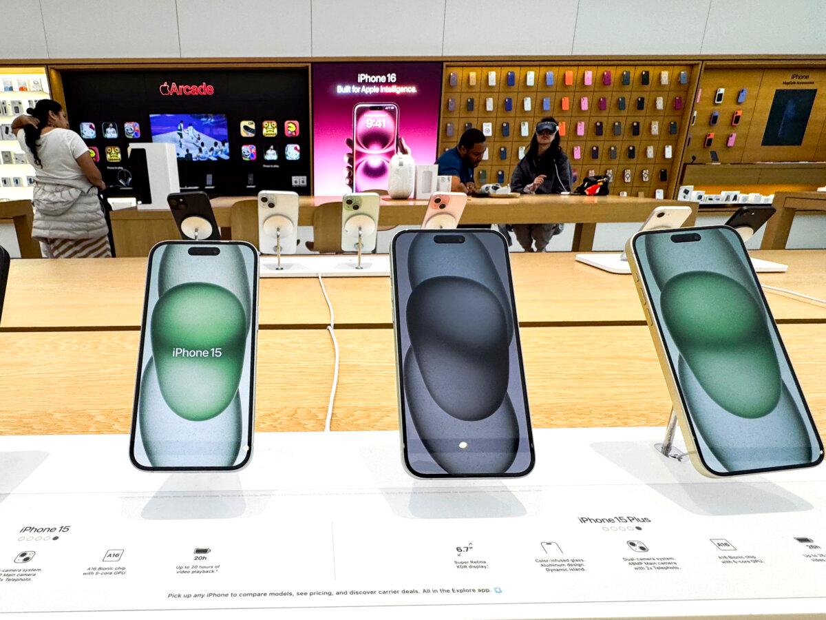 Apple iPhones are displayed in a store in Washington on April 8, 2025. (Roberto Schmidt/AFP via Getty Images)