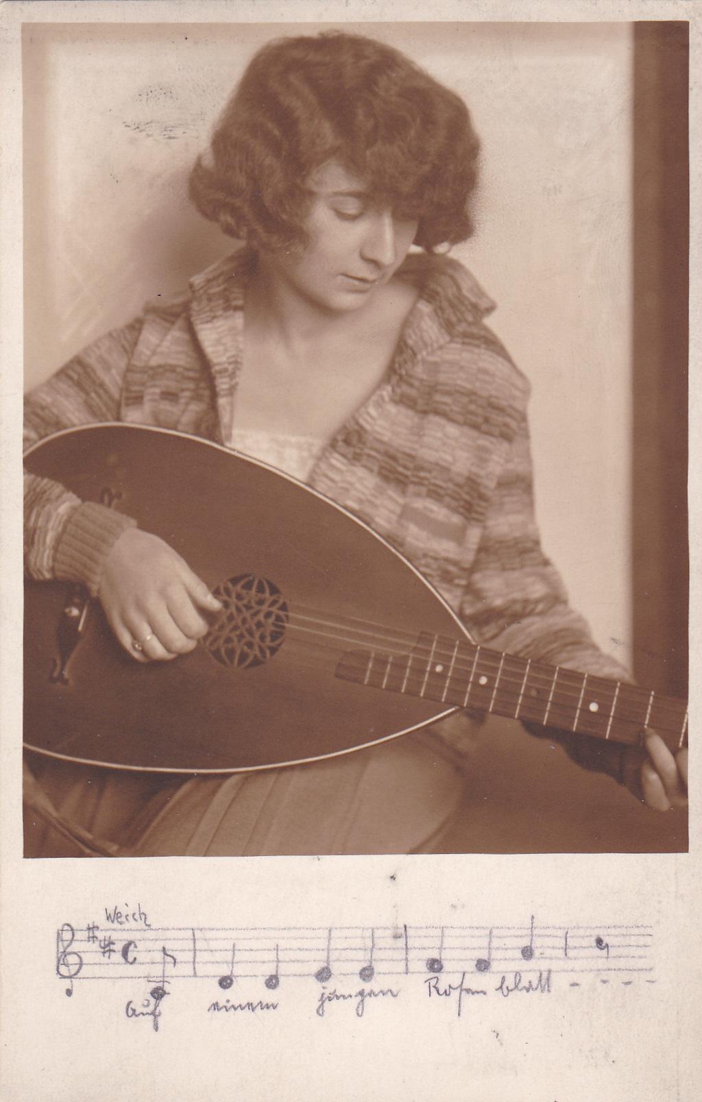 Ilse Herlinger playing a lute, 1928. (Kingston Ostrava Scroll Group/Jewish Museum, Prague).