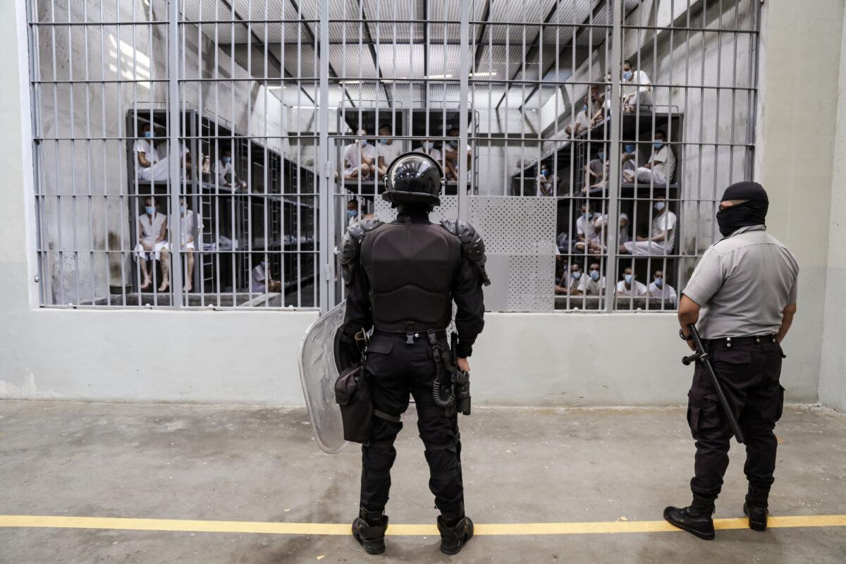 Prisoners stand outside a cell block at the Centre for Terrorism Confinement (CECOT) in Tecoluca, El Salvador, on April 4, 2025. (Alex Peña/Getty Images)