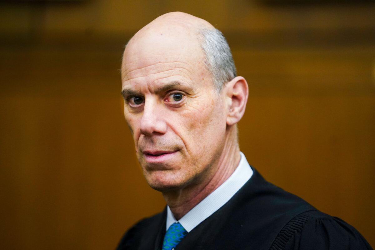 District Judge James Boasberg, chief judge of the District Court for the District of Columbia, stands for a portrait at E. Barrett Prettyman Federal Courthouse in Washington on March 16, 2023. (Carolyn Van Houten/The Washington Post via AP)