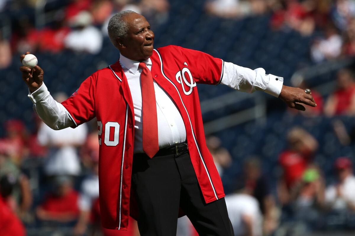 Baseball Hall of Famer Frank Robinson throws out the first pitch before the Atlanta Braves play the Washington Nationals at Nationals Park in Washington, D.C., on May 9, 2015. (Patrick Smith/Getty Images)