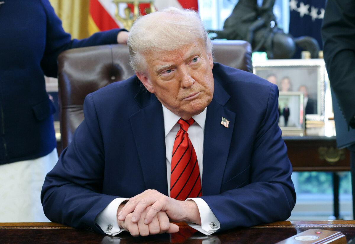 President Donald Trump speaks to reporters after signing the declaration at the White House's oval office on April 17, 2025 (Win McNamee/Getty Images)