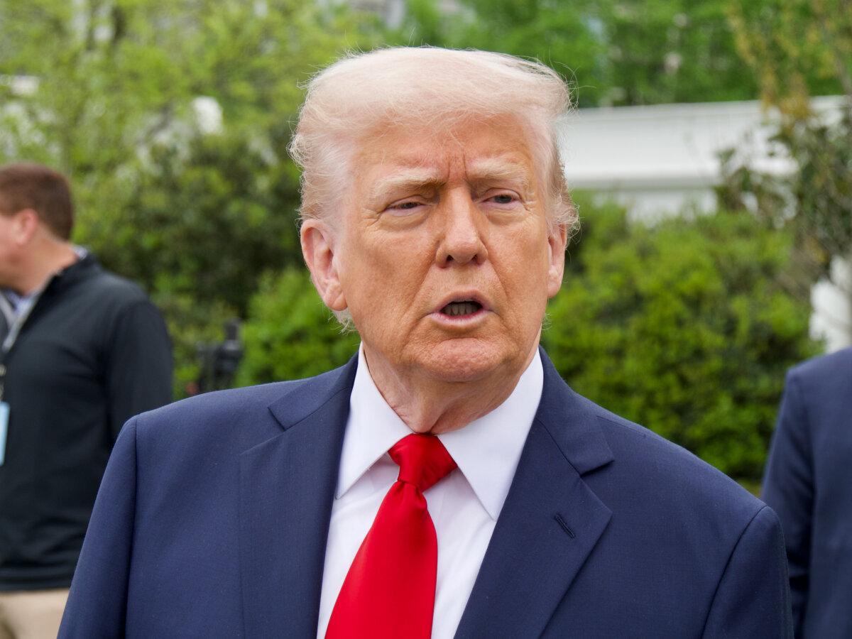 President Donald Trump speaks to reporters during the Easter Egg Roll event at the White House on April 21, 2025. (Travis Gillmore/The Epoch Times)