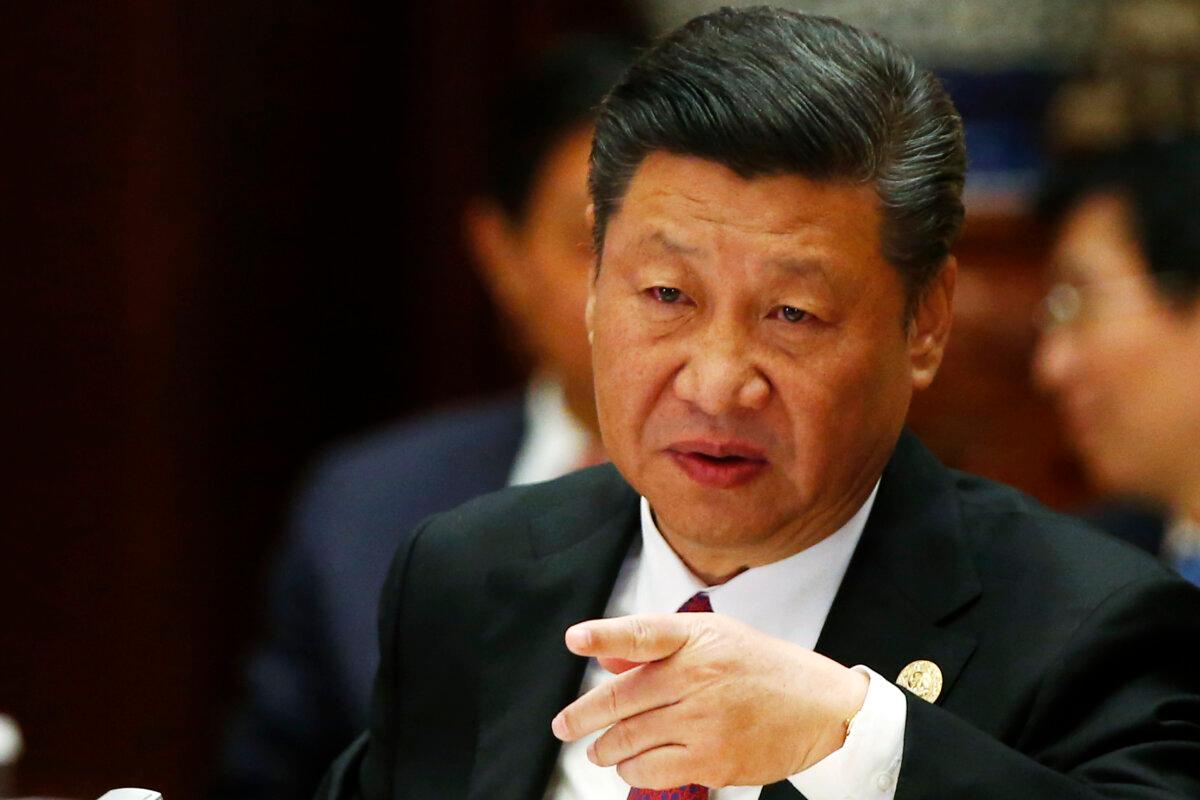 Chinese leader Xi Jinping attends a summit at the Belt and Road Forum in Beijing on May 15, 2017. (Thomas Peter - Pool/Getty Images)