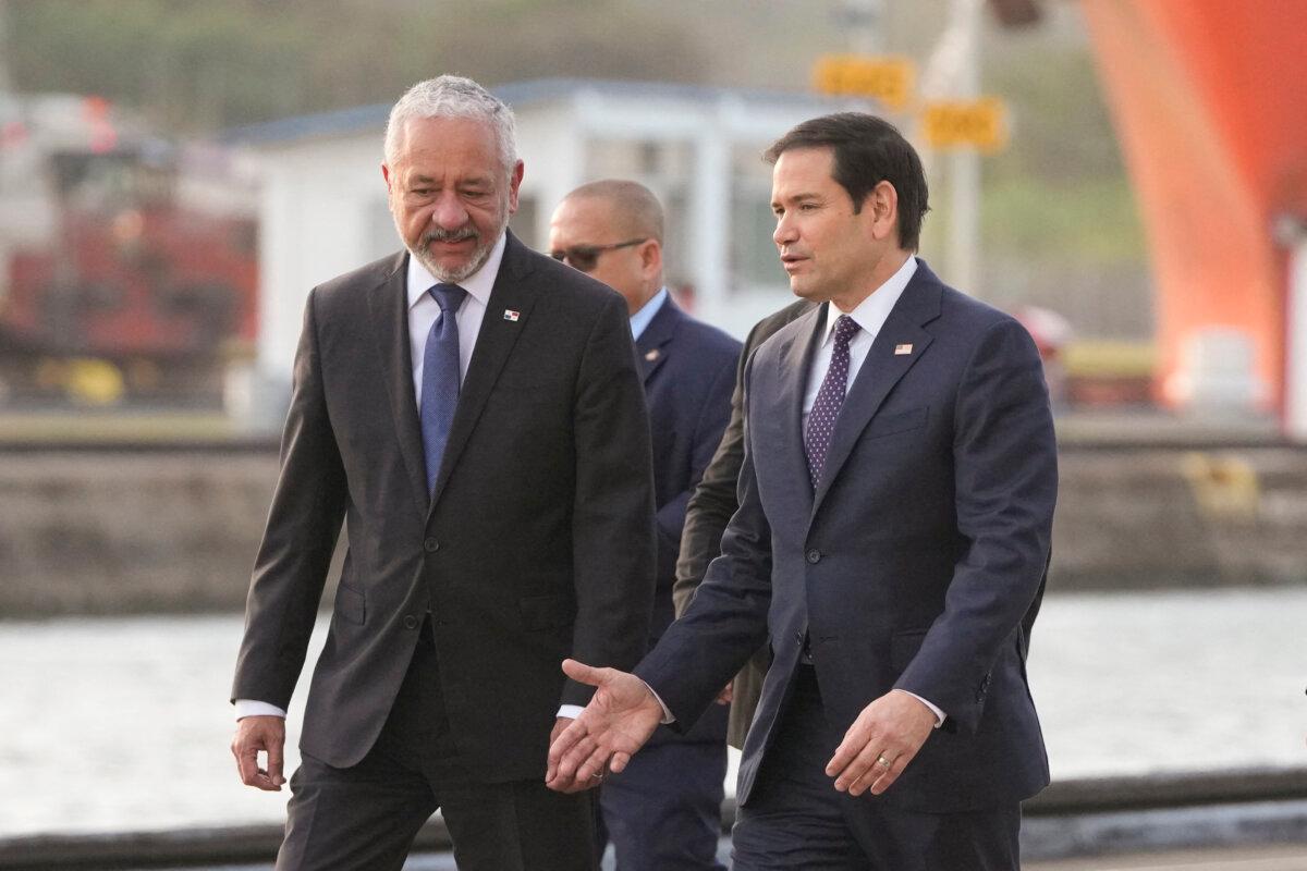 U.S. Secretary of State Marco Rubio (R) talks to Panama Canal Authority Administrator Ricaurte Vasquez during a tour at the Miraflores locks of the Panama Canal in Panama City on Feb. 2, 2025. (Mark Schiefelbein/POOL/AFP via Getty Images)