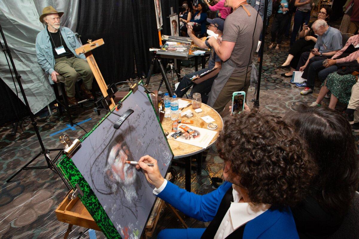 French American figurative artist Shane Wolf was among the 15 world-renowned artists who created portraits from live models in the Face-Off event at the 26th Portrait Society of America’s "The Art of the Portrait" Conference, at the Grand Hyatt Atlanta, in Buckhead, Ga., on April 25, 2024. Attendees of the 2025 conference will be able to see 18 eminent artists create portraits. (Courtesy of the Portrait Society of America)