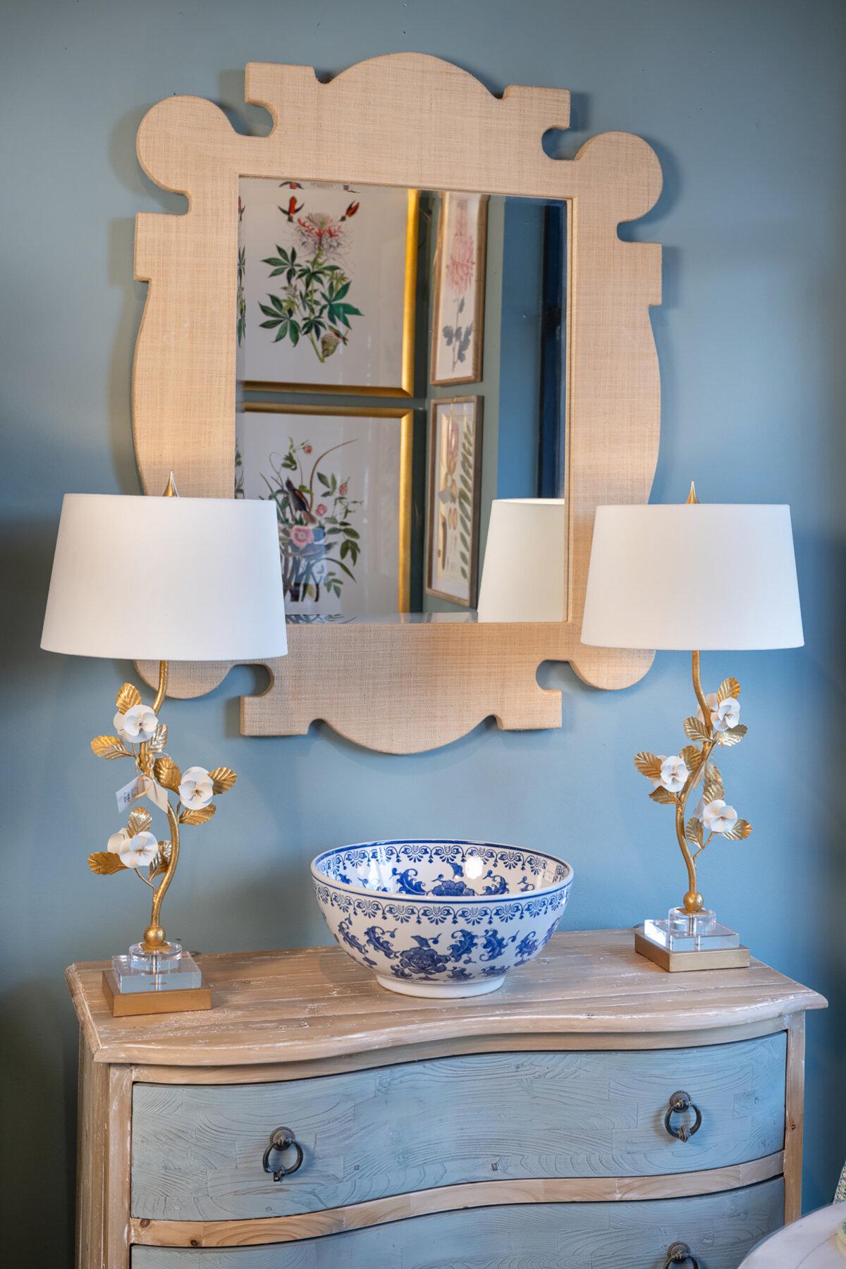 Feature larger pieces or mirrors over chests, as they break up the space and add help define a space (or create a new one).(Handout/TNS)