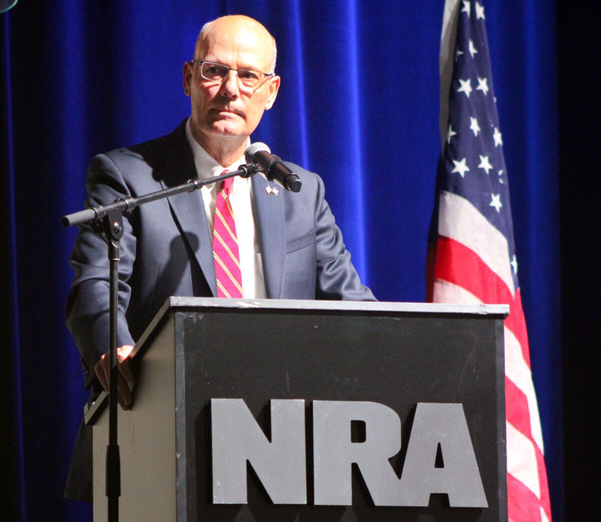 Doug Hamlin, the National Rifle Association's executive vice president and CEO, addresses the group's annual meeting in Atlanta on April 26, 2025. (Michael Clements/The Epoch Times)