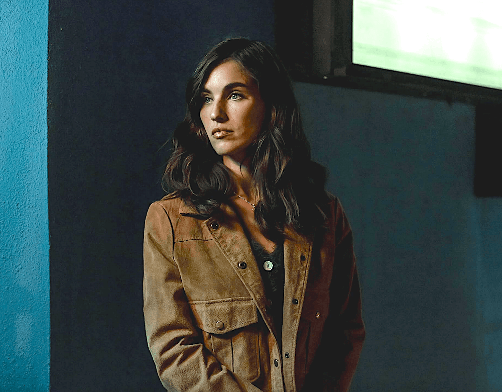 Astor Grey (Rainey Qualley), in "Off The Record." (Quiver Distribution)