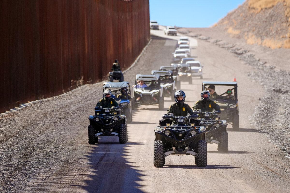 Homeland Security Secretary Kristi Noem (C) rides a four-wheeler during a tour along the Nogales border wall at the Mariposa Port of Entry in Nogales, Ariz., on March 15, 2025. (Alex Brandon/AFP via Getty Images)
