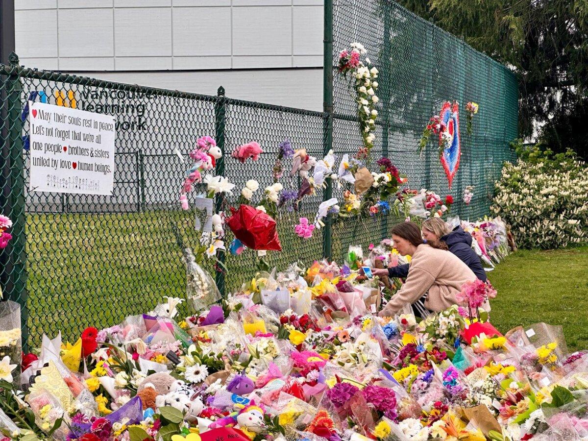 Community members pay tribute to the victims of the April 26 Lapu Lapu Filipino Festival car attack in Vancouver on April 28, 2025. (Melodie Von/NTD News)