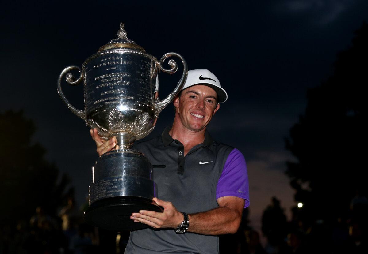Rory McIlroy of Northern Ireland poses with the Wanamaker trophy after his one-stroke victory during the final round of the 96th PGA Championship at Valhalla Golf Club in Louisville, Kentucky, on Aug. 10, 2014. (Warren Little/Getty Images)