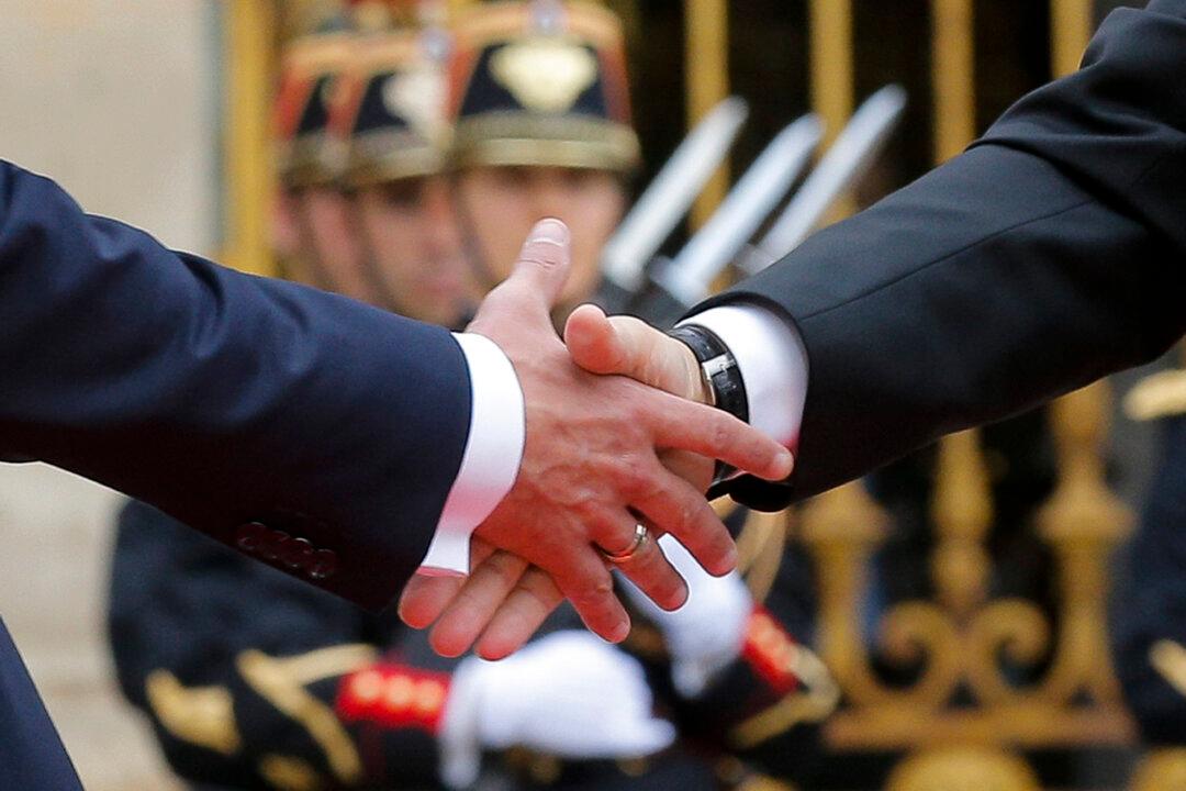 Secret Russian Military Intelligence Unit Implicated in Major Hacks: Paris