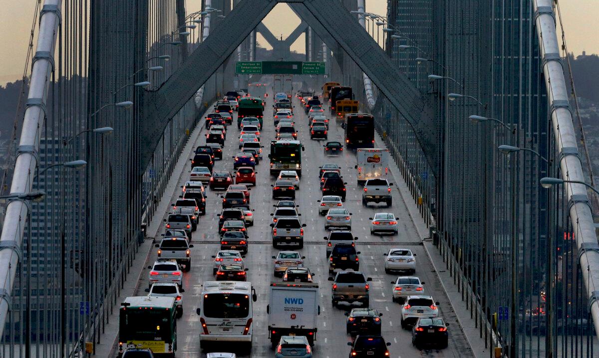 Vehicles make their way westbound on Interstate 80 across the San Francisco–Oakland Bay Bridge as seen from Treasure Island in San Francisco on Dec. 10, 2015. (Ben Margot/AP Photo)