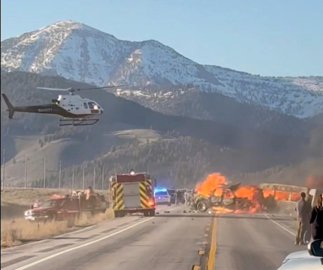 Rescue workers arrive to the scene after a deadly collision between a pickup truck and tour van near Henry’s Lake State Park in eastern Idaho on May 1, 2025. (Roger Merrill via AP)