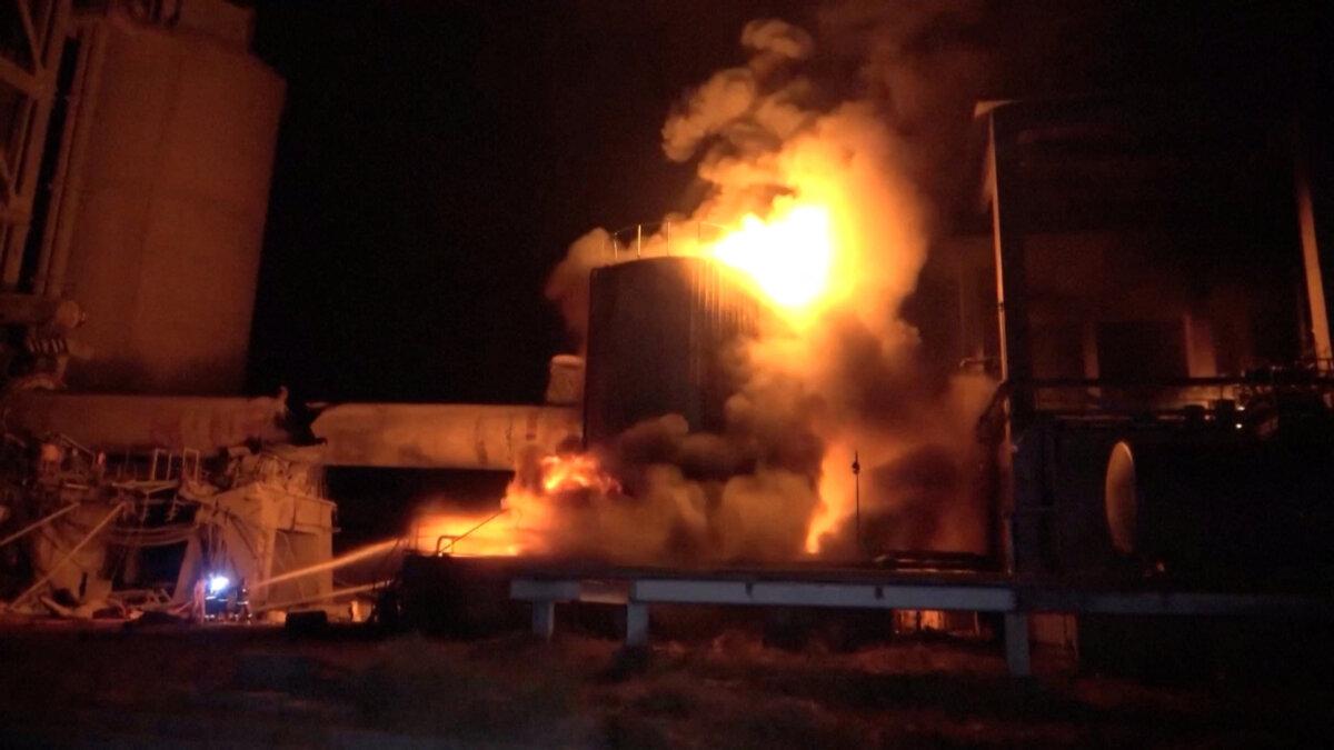 Fires erupt at a cement factory in Yemen after the Israeli military said it carried out airstrikes against Hodeidah Port on May 5, 2025. (Al-Masirah TV/Handout via Reuters)