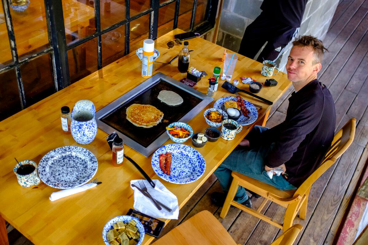 Kevin Bolton has make-your-own pancakes at the De Leon Springs State Park pancake restaurant. (Patrick Connolly/Orlando Sentinel/TNS)