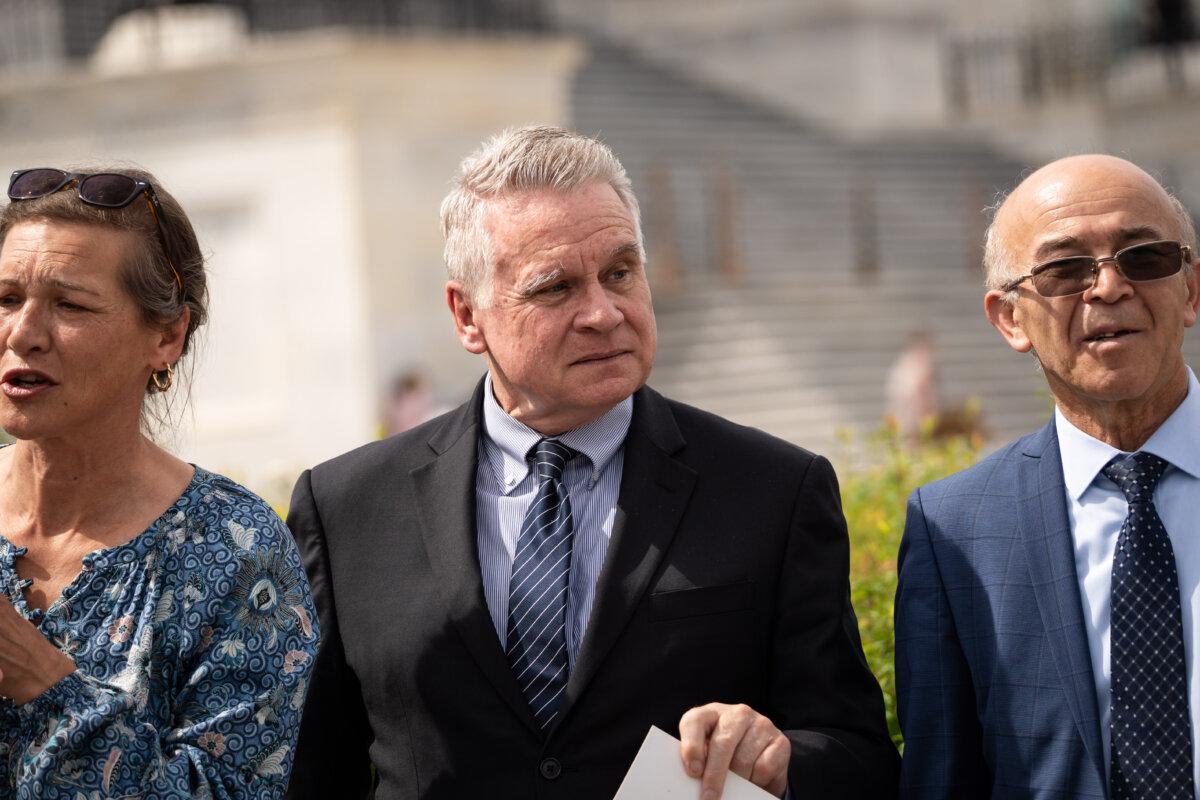 Rep. Chris Smith (RN.J.), co-chairs China's Parliament's Executive Committee, will listen at a press conference on the forced organ collection law at a stop that passed through the Capitol Hill home on May 7, 2025.