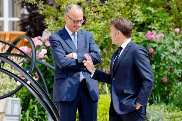 Macron, Merz Call on EU to Scrap Supply Chain Sustainability Law