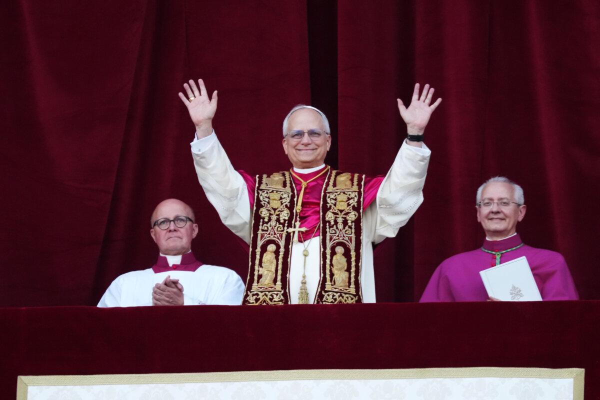 The newly elected Pontiff, Pope Leo XIV is seen for the first time from the Vatican balcony in Vatican City, on May 8, 2025. (Christopher Furlong/Getty Images)