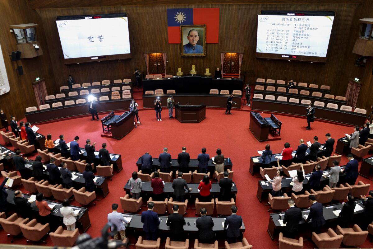 Elected legislators attend a swearing-in ceremony at the chamber of the Legislative Yuan on the first day of session in Taipei, Taiwan, on Feb. 1, 2024. (I-Hwa Cheng/AFP via Getty Images)