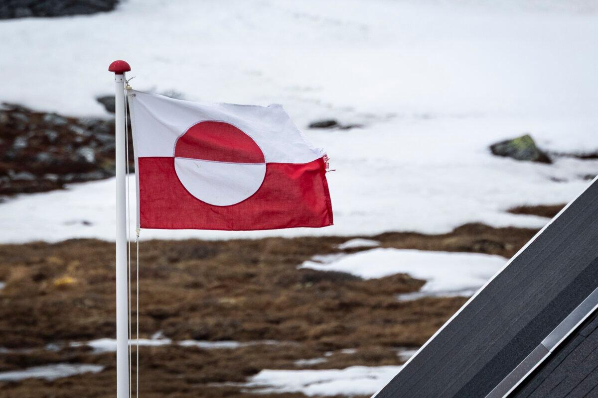 The flag of Greenland blows outside of Nuuk, Greenland, on May 4, 2025. (John Fredricks/The Epoch Times)