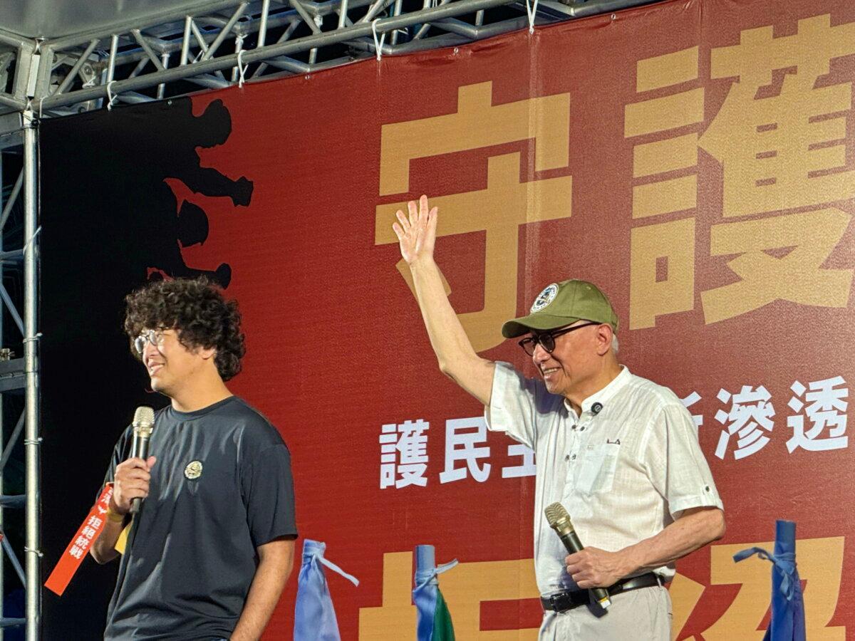 Taiwanese legislator Puma Shen (L) and businessman Robert Tsao Hsing-cheng take part in a rally supporting the mass recall petitions in Keelung, Taiwan, on May 3, 2025. (Sun Xiangyi/The Epoch Times)