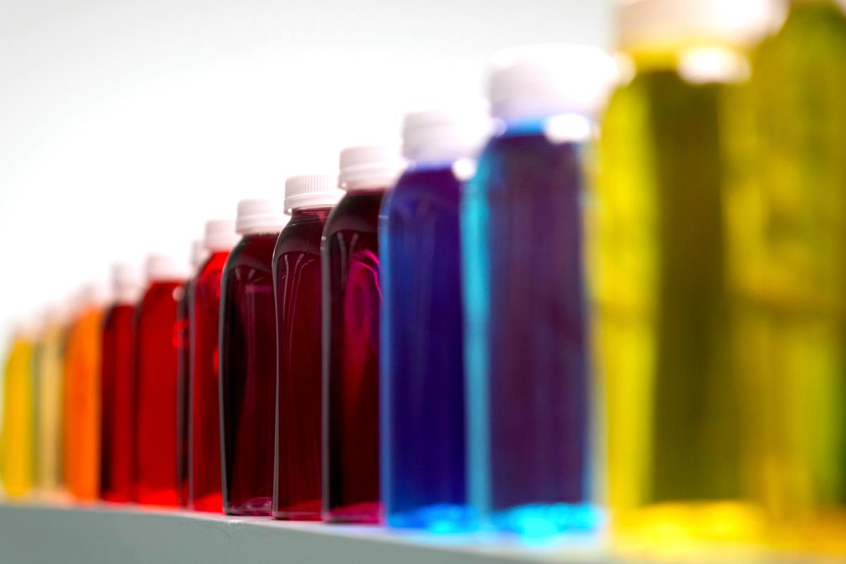 The bottles containing liquids of various colors will be on the shelves of the Color Additive Manufacturing Compant lab in St. Louis on April 2, 2025.
