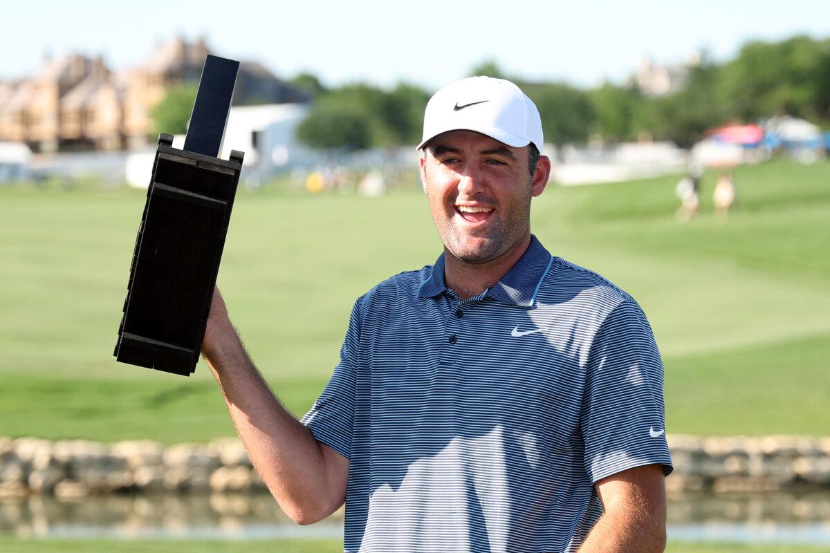 Scottie Scheffler of the United States celebrates with the trophy after winning THE CJ CUP Byron Nelson 2025 at TPC Craig Ranch in McKinney, Texas, on May 4, 2025. (Stacy Revere/Getty Images)