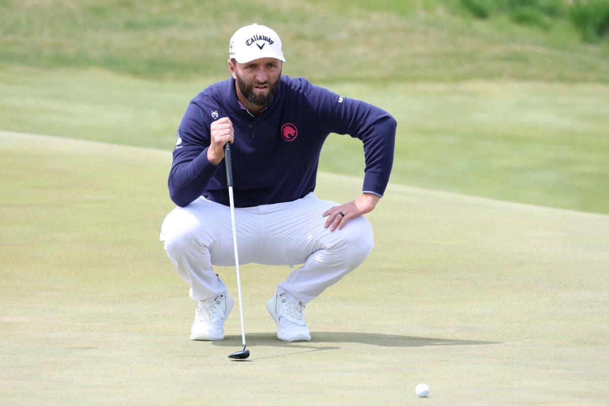 Jon Rahm of Legion XIII lines up a putt on the 10th green on day one of LIV Golf Korea at Jack Nicklaus GC Korea in Incheon, South Korea on May 2, 2025. (Chung Sung-Jun/Getty Images)