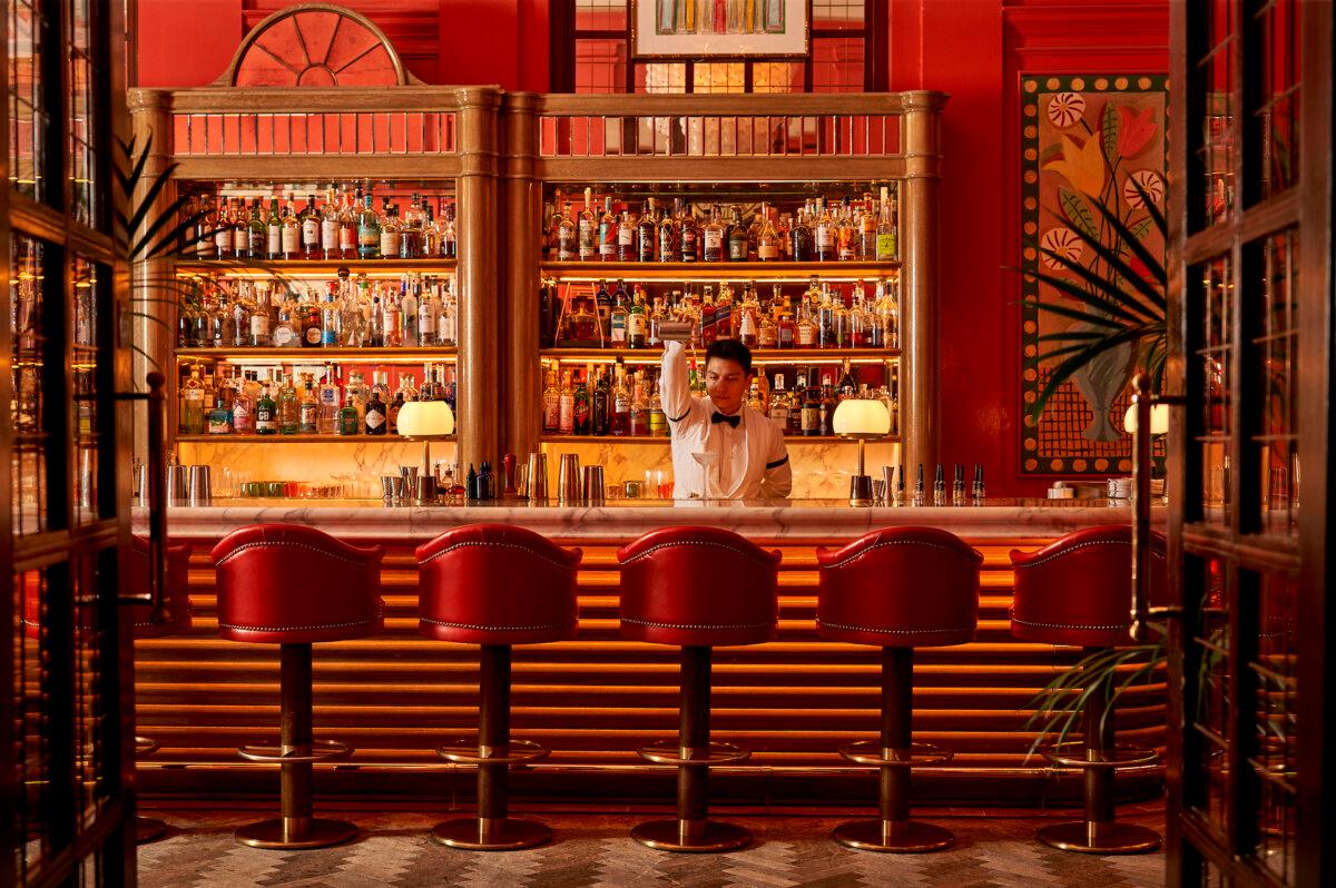 The Coral Room at the Bloomsbury Hotel brings a tropical vibe to London with its vibrant colors and exotic cocktails. (Milo Brown/The Doyle Collection/TNS)