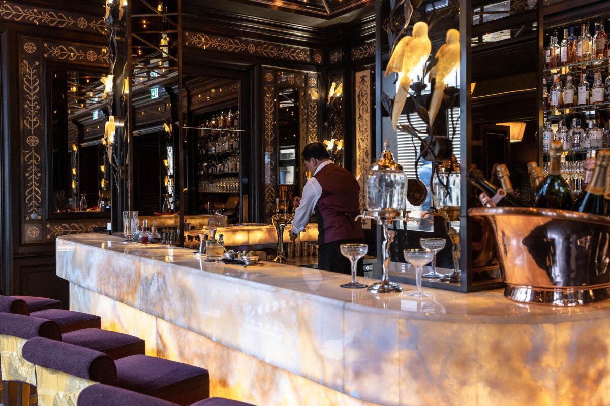 The bartender at the Hotel l'Oscar in Covent Garden sets up for the pre-theater crowd in London's West End. (Gregoire Gardette/The Doyle Collection/TNS)