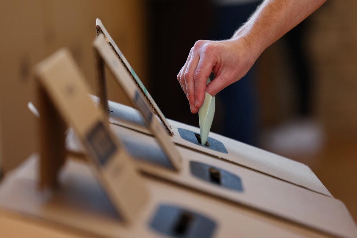 Voting will be posted in the voting box at Kew Elementary School in Melbourne, Australia on May 3, 2025 (Morgan Hancock/Getty Images)