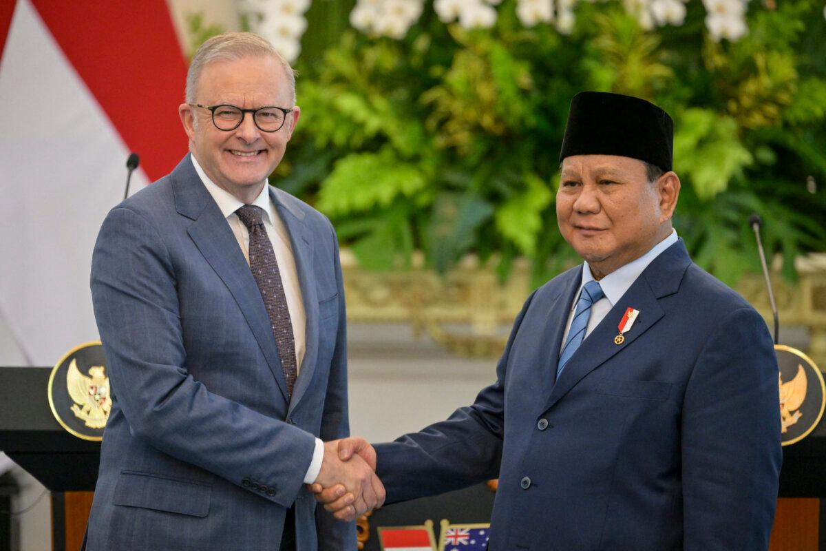 Indonesian President Prabowo Subianto (R) and Australian Prime Minister Anthony Albanese (L) shake hands after a joint press conference at the Merdeka Palace in Jakarta, Indonesia on May 15, 2025. (Bay Ismoyo/AFP via Getty Images)