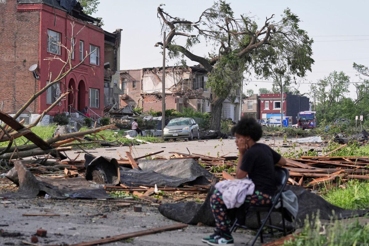 People investigated the damage after a severe storm travelled through St. Louis, Missouri on May 16, 2025 (Jeff Roberson/AP Photo)