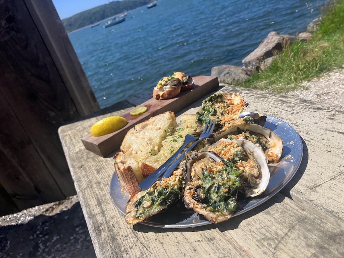 Oysters Rockefeller and smoked oysters are two of the six styles of oyster preparations available at The Marshall Store overlooking Tomales Bay. (Kate Bradshaw/Bay Area News Group)