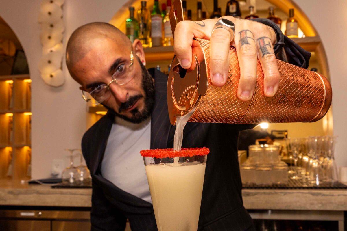 A bartender makes a cocktail inside the bar at Donatella on May 1, 2025, in Miami, Florida. (D.A. Varela/Miami Herald/TNS)