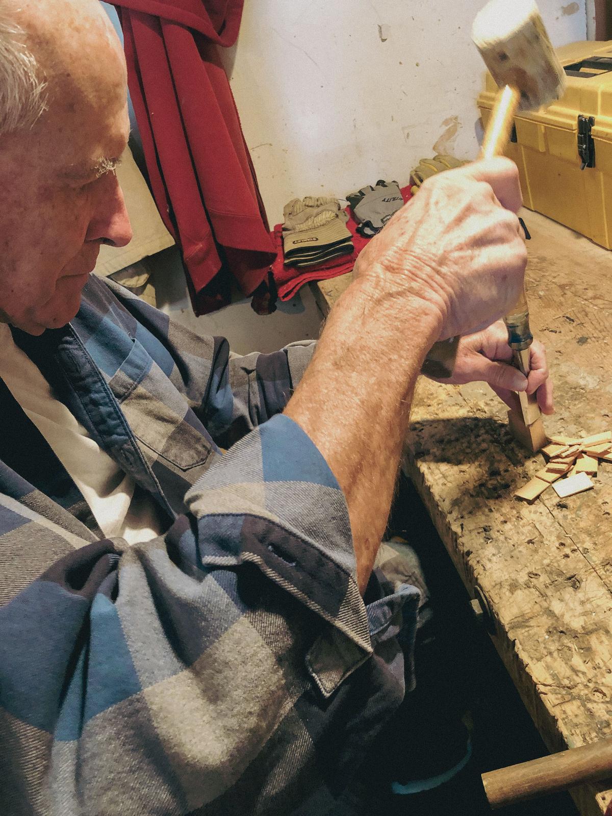 Bresadola cuts and installs each shingle by hand. (Courtesy of Tom Bresadola)