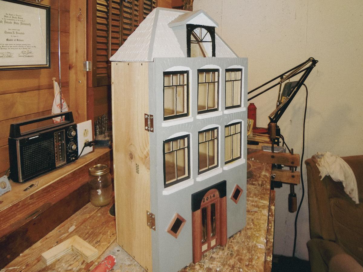 The doll house concept all started with some empty, wooden wine boxes. (Courtesy of Tom Bresadola)