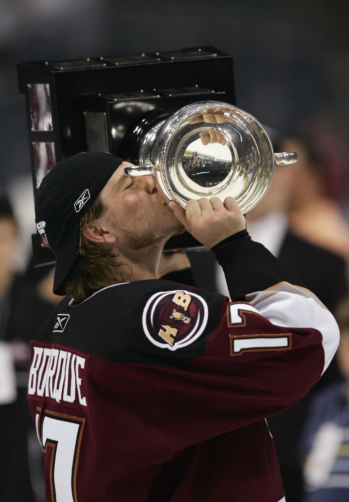 Chris Bourque #17 of the Hershey Bears kisses the Calder Cup after the Hershey Bears defeated the Milwaukee Admirals in game six of the AHL Calder Cup Finals at the Bradley Center in Milwaukee, Wis., on June 15, 2006. (Jonathan Daniel/Getty Images)