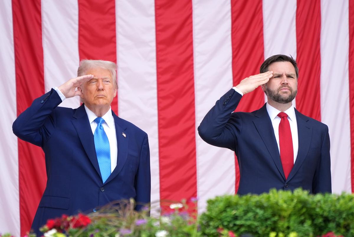 President Donald Trump (L) and Vice President JD Vance salute during the 157th National Memorial Day Observance at Arlington National Cemetery in Virginia on May 26, 2025. (Jacquelyn Martin/AP Photo)