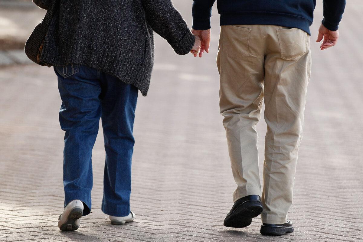 An elderly couple walk in Sydney, Australia, on June 2, 2016. (Brendon Thorne/Getty Images)