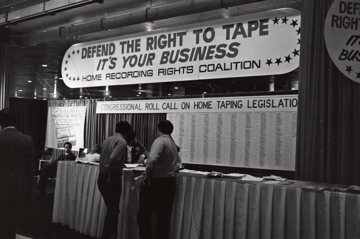 A 1982 booth at CES promoting the right to make home recordings. The Supreme Court decision was reached in 1984. (<a href="https://www.flickr.com/people/42274165@N00">Alan Light</a>/<a href="https://creativecommons.org/licenses/by/2.0/">CC BY 2.0</a>)