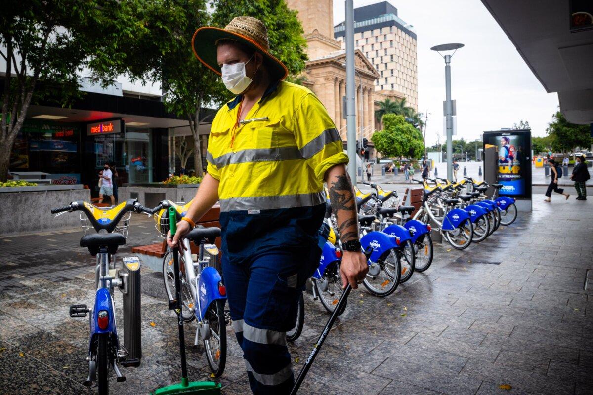 A Brisbane City Council worker walks along the Queen Street Mall in Brisbane, Australia, on Jan. 8, 2021. (Patrick Hamilton/AFP /AFP via Getty Images)