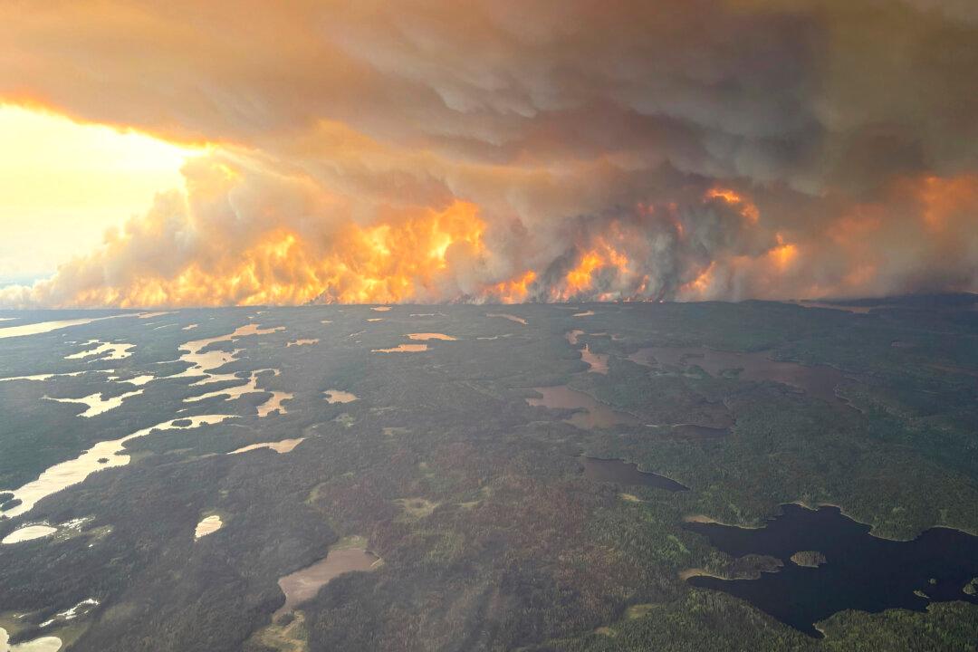 More Evacuations Ordered as Crews Battle Wildfires Burning in Manitoba