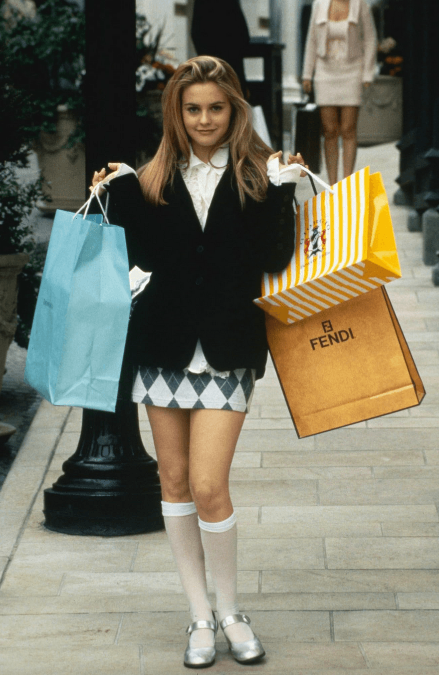Cher Horowitz (Alicia Silverstone) after a satisfactory shopping spree, in "Clueless." (Paramount Pictures)