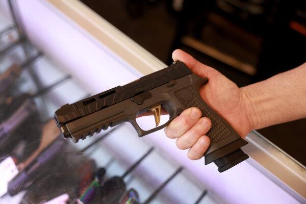 A Sig Sauer P320 handgun is shown at a gun store in Delray Beach, Florida, on Jan. 31, 2023. (Raedle/Getty Images)
