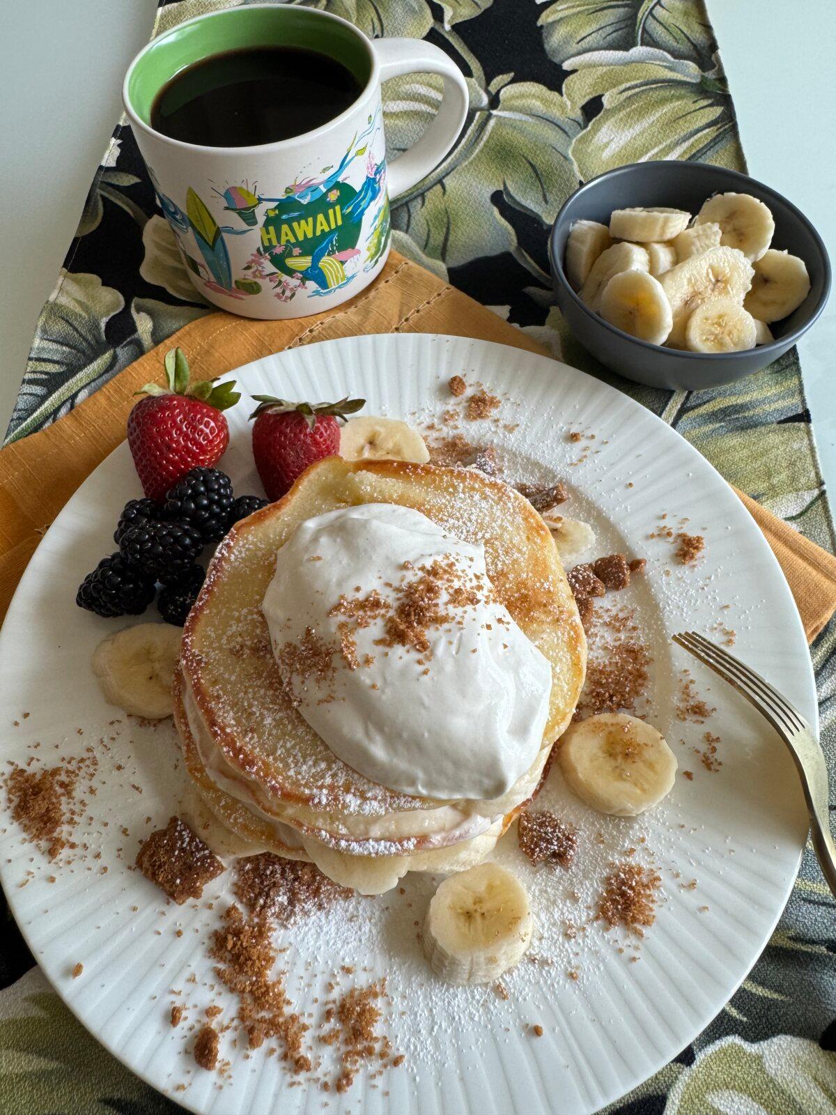 Coconut whipped cream gilds the pancake stack, while crumbled graham crackers call to mind the crunchy crust on a traditional pie. (JeanMarie Brownson/TCA)