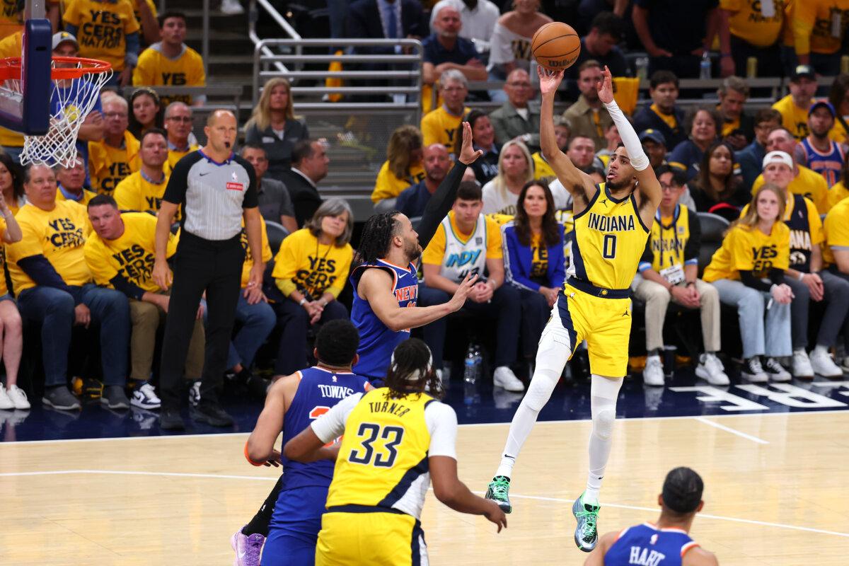 Tyrese Haliburton (0) of the Indiana Pacers attempts a jump shot against Jalen Brunson (11) of the New York Knicks during the fourth quarter in Game Four of the Eastern Conference Finals of the 2025 NBA Playoffs at Gainbridge Fieldhouse in Indianapolis, Indiana on May 27, 2025. (Gregory Shamus/Getty Images)