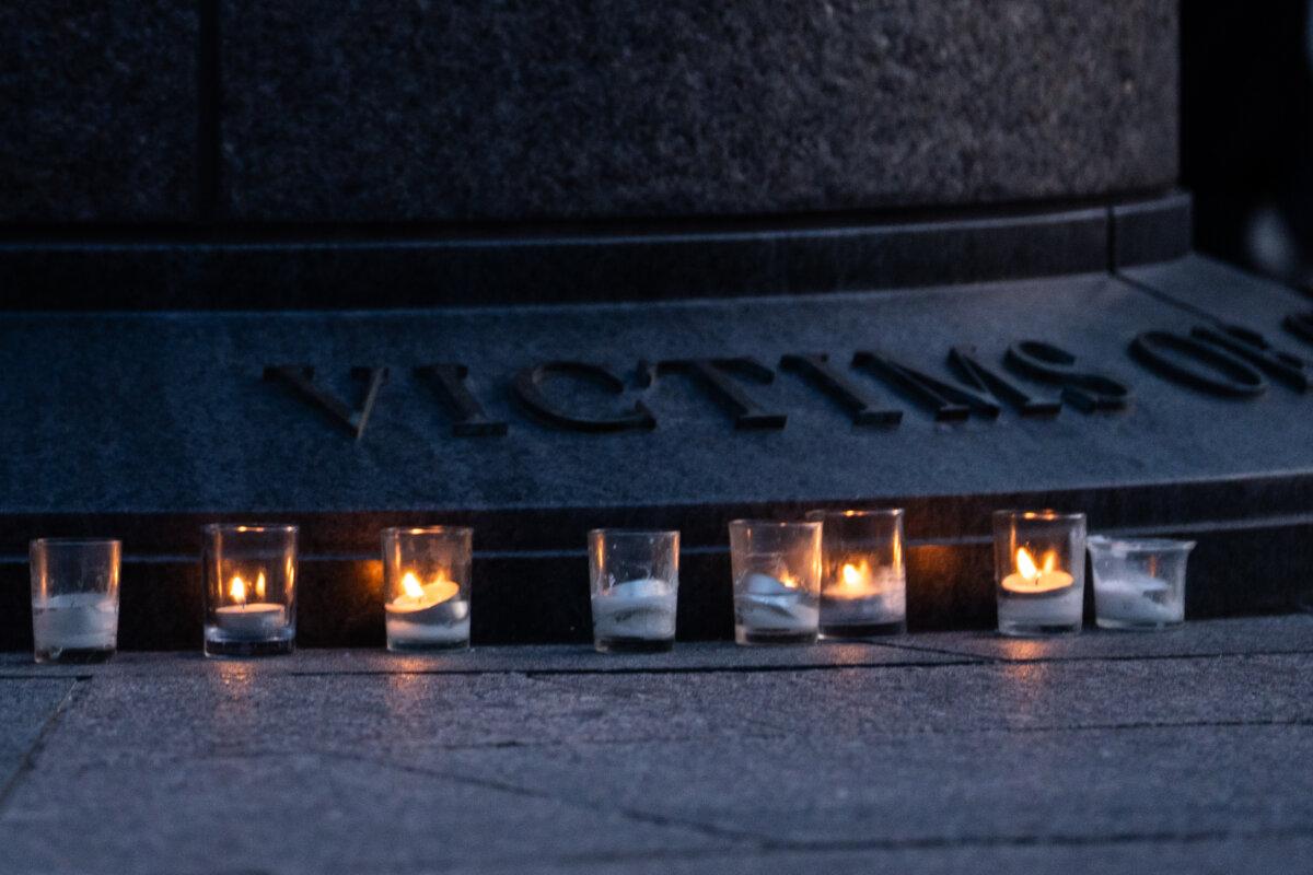 People take part in a candlelight vigil commemorating the anniversary of the Tiananmen Square Massacre in China, at the Victims of Communism Memorial in Washington on June 4, 2025. (Madalina Vasiliu/The Epoch Times)